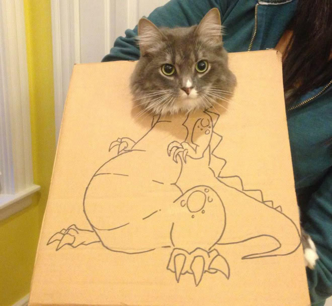 Cardboard dinosaur cat.