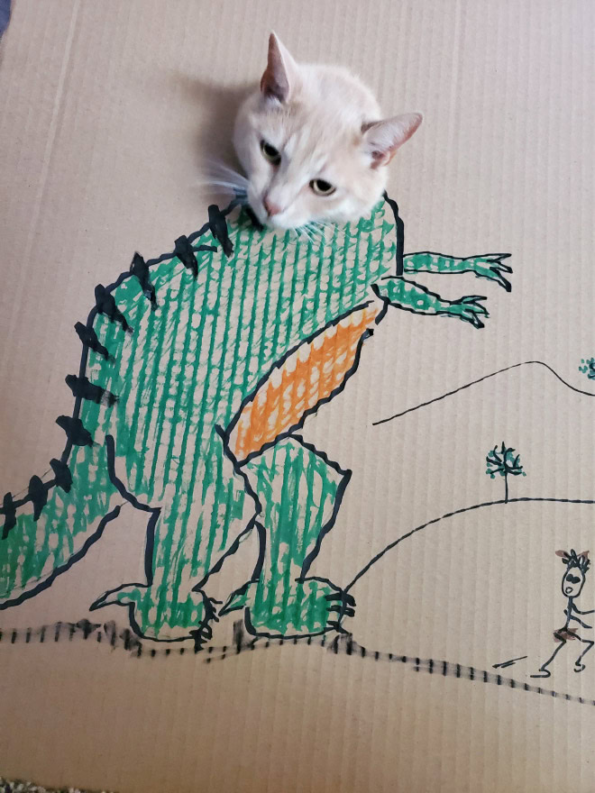 Cardboard dinosaur cat.