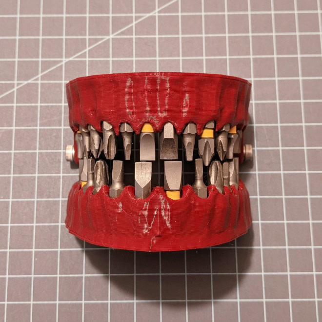 3D printed denture drill bit holder.