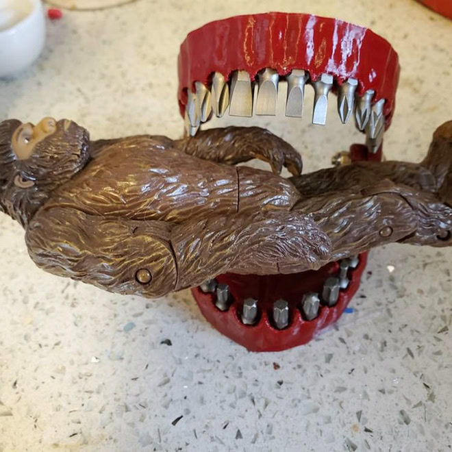 3D printed denture drill bit holder.