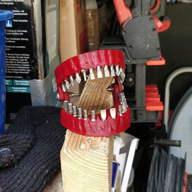 3D printed denture drill bit holder.