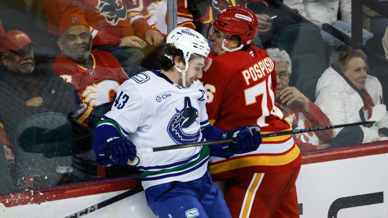 Canucks grind out comeback win to even wild-card race with Flames