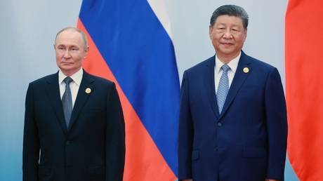 Putin holds talks with Xi in Beijing: Live Updates