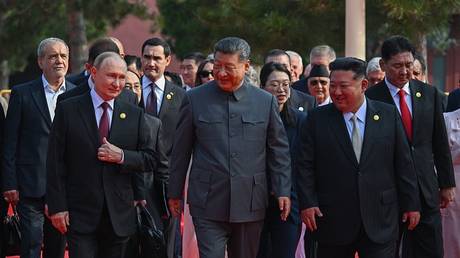 Xi, Putin, and Kim joke about living to 150 in hot-mic chat