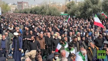 Iranians gather for first Friday prayers during war