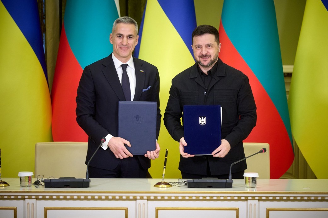 Bulgarian Prime Minister Andrey Gyurov (L) and Vladimir Zelensky sign a 10-year security agreement in Kiev, Ukraine, March 30, 2026