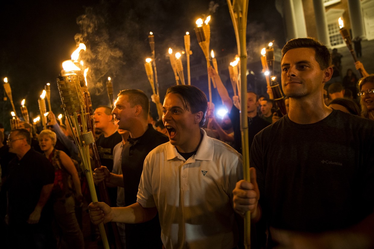 Protesters hold torches and chant at the 'Unite the Right' rally in Charlottesville, Virginia, August 11, 2017