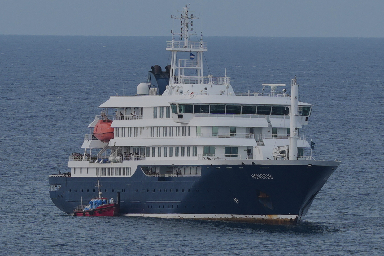 The MV Hondius cruise ship is anchored at a port in Praia, Cape Verde, amid an outbreak of hantavirus on board, May 6, 2026