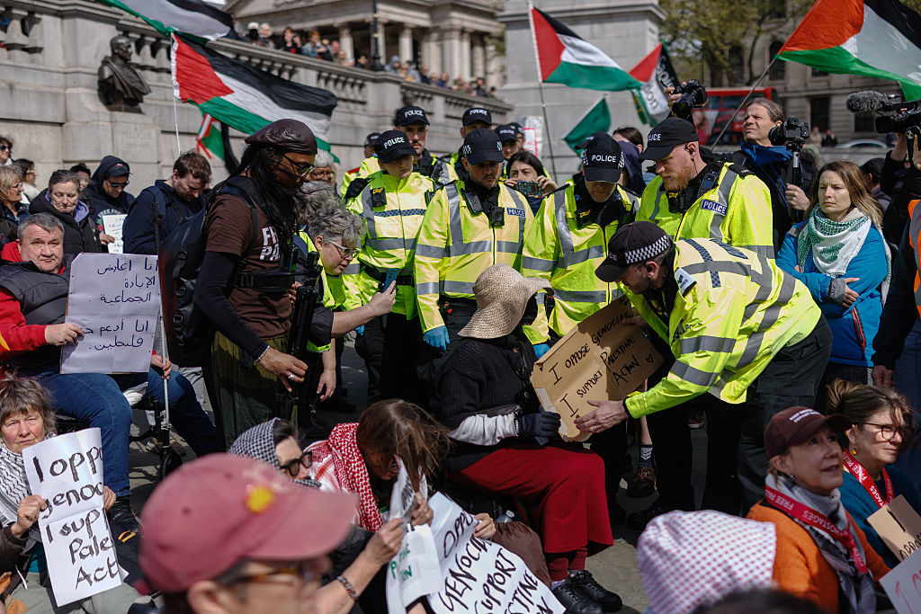 British police arrest 'Palestine Action' supporters at a demonstration in London, England, April 11, 2026