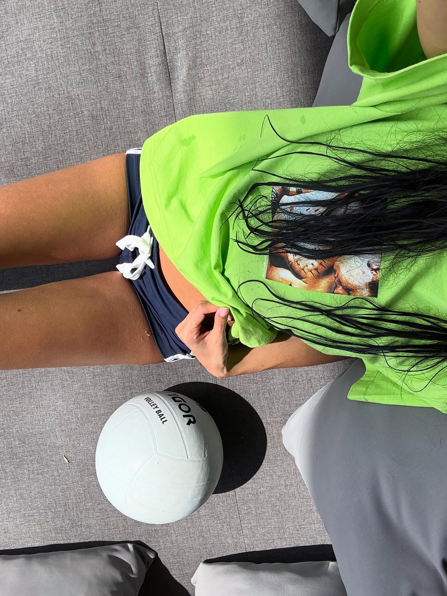 An image of a woman wearing green apple color trend summer 2026