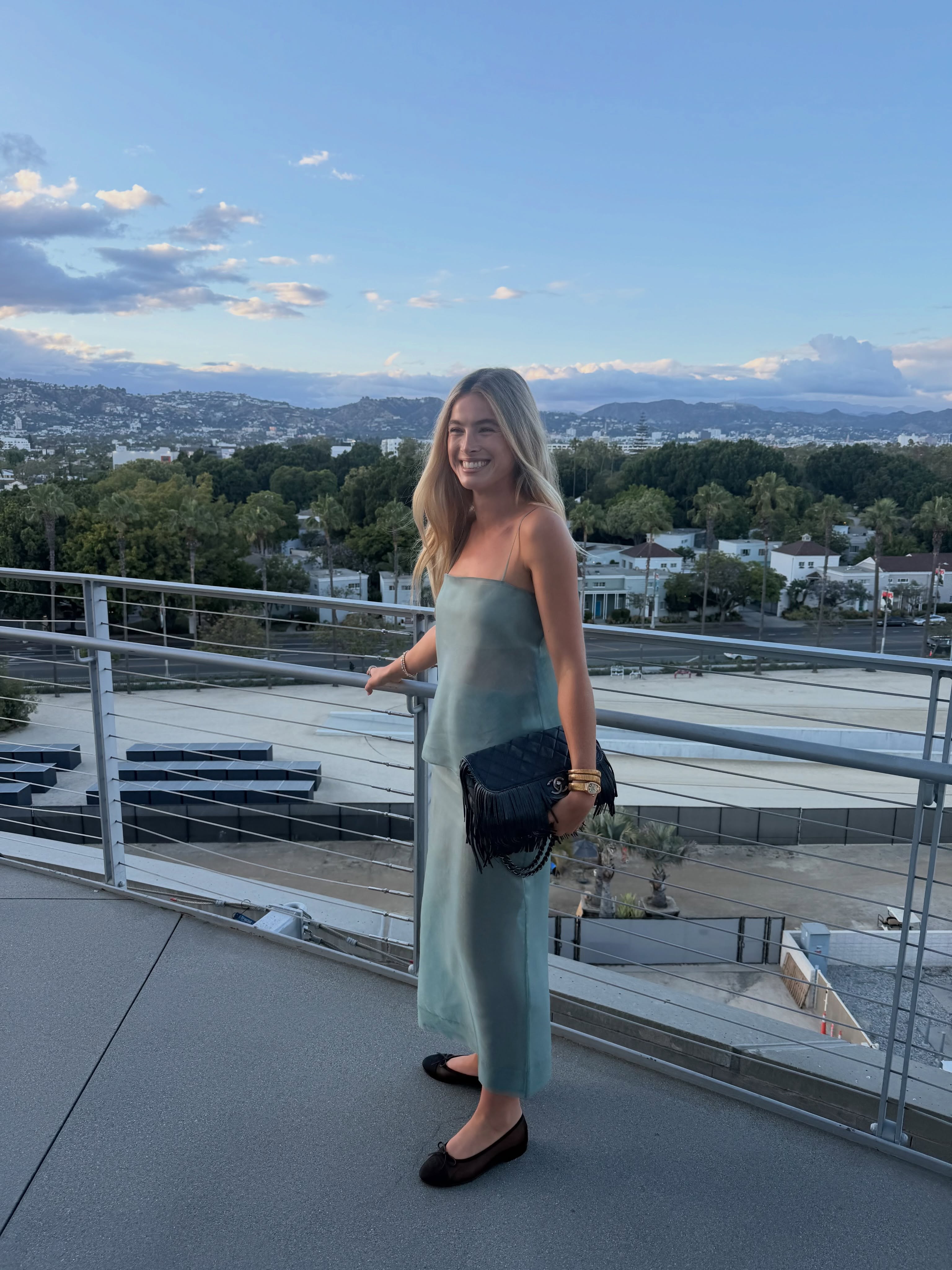 An image of a woman wearing summer ballet flats outfit idea 2026