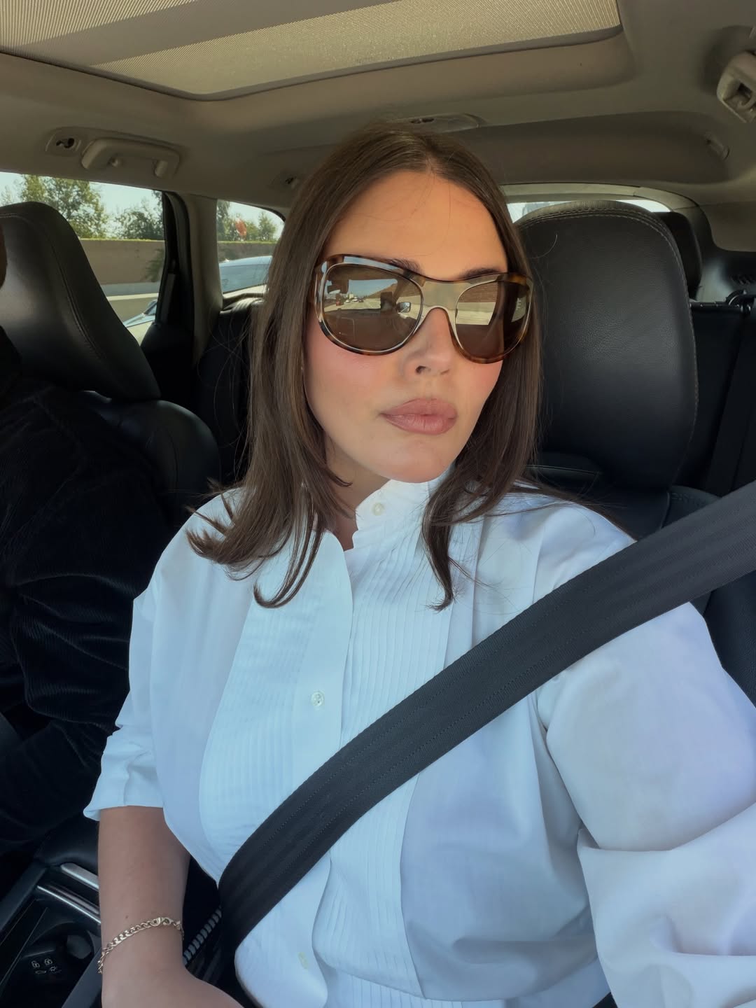Alessandra Garcia in bug-eye sunglasses