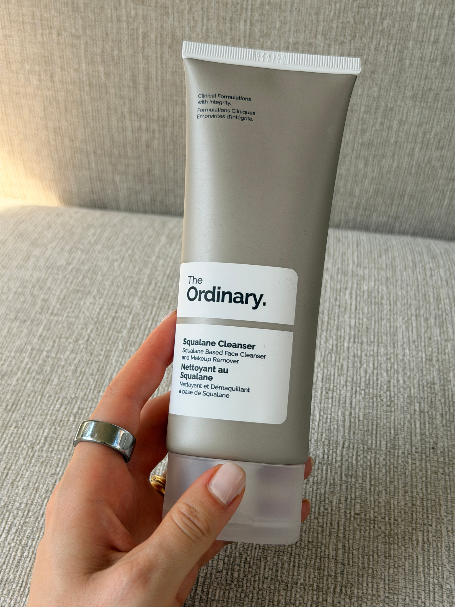 Grace holding The Ordinary Squalane Cleanser