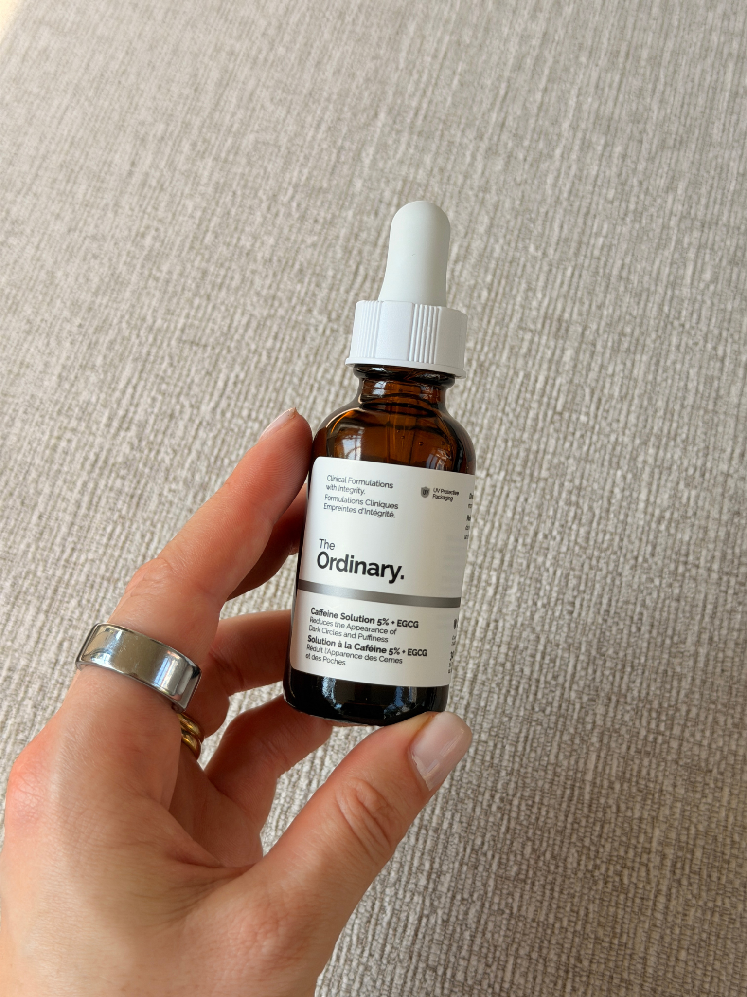 Grace holding The Ordinary Caffeine Solution