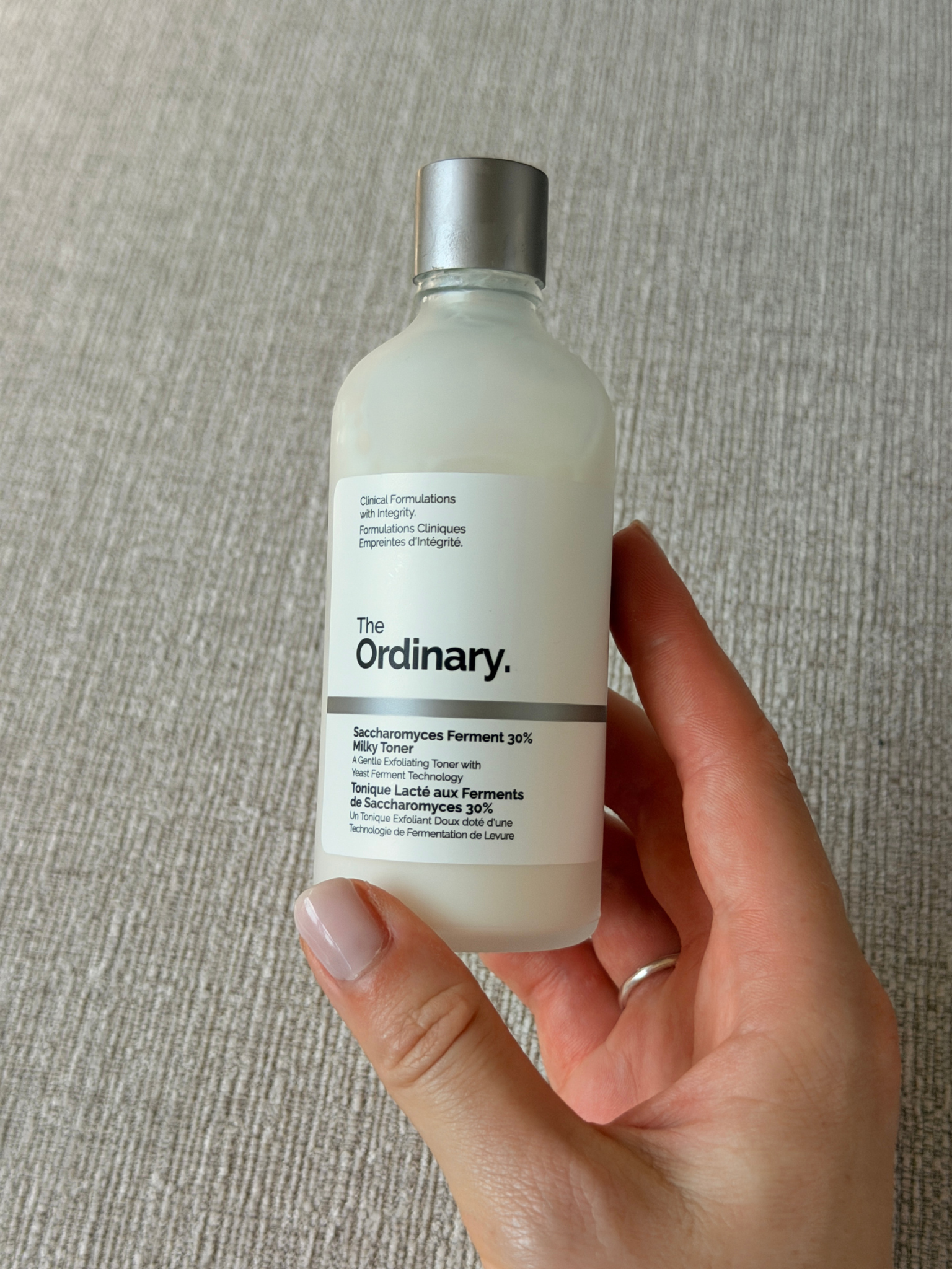 Grace holding The Ordinary  Saccharomyces Ferment Milky Toner