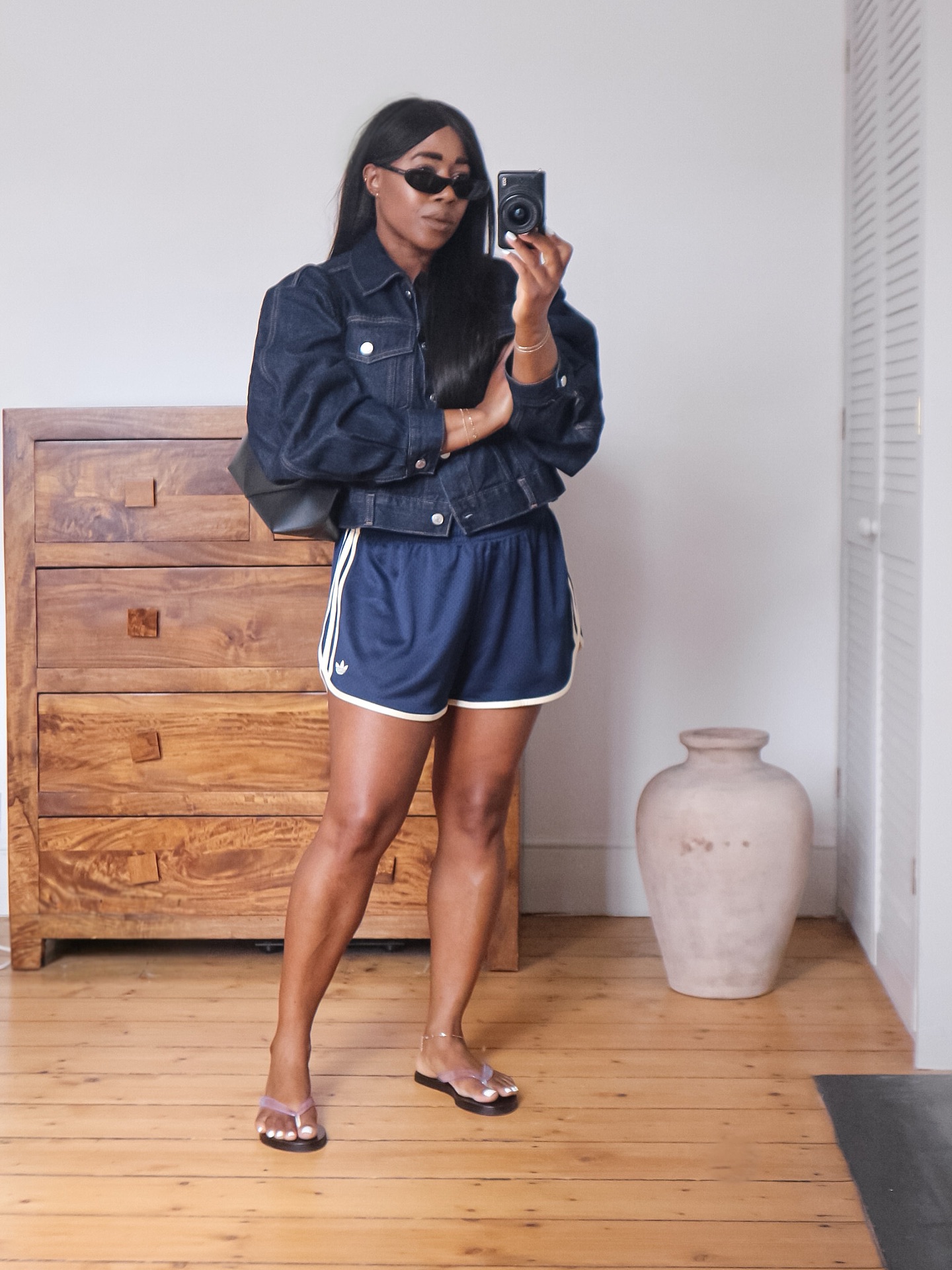 An image of a woman wearing best shoes with sporty shorts