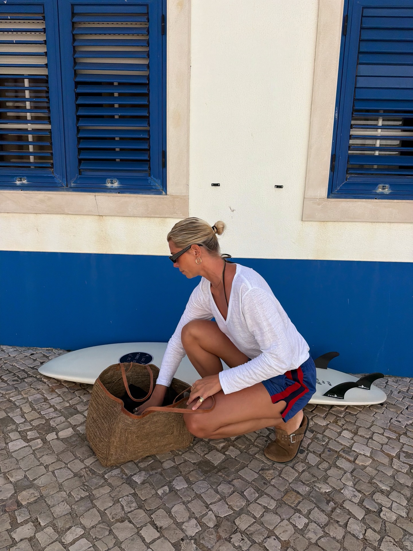 An image of a woman wearing best shoes with sporty shorts