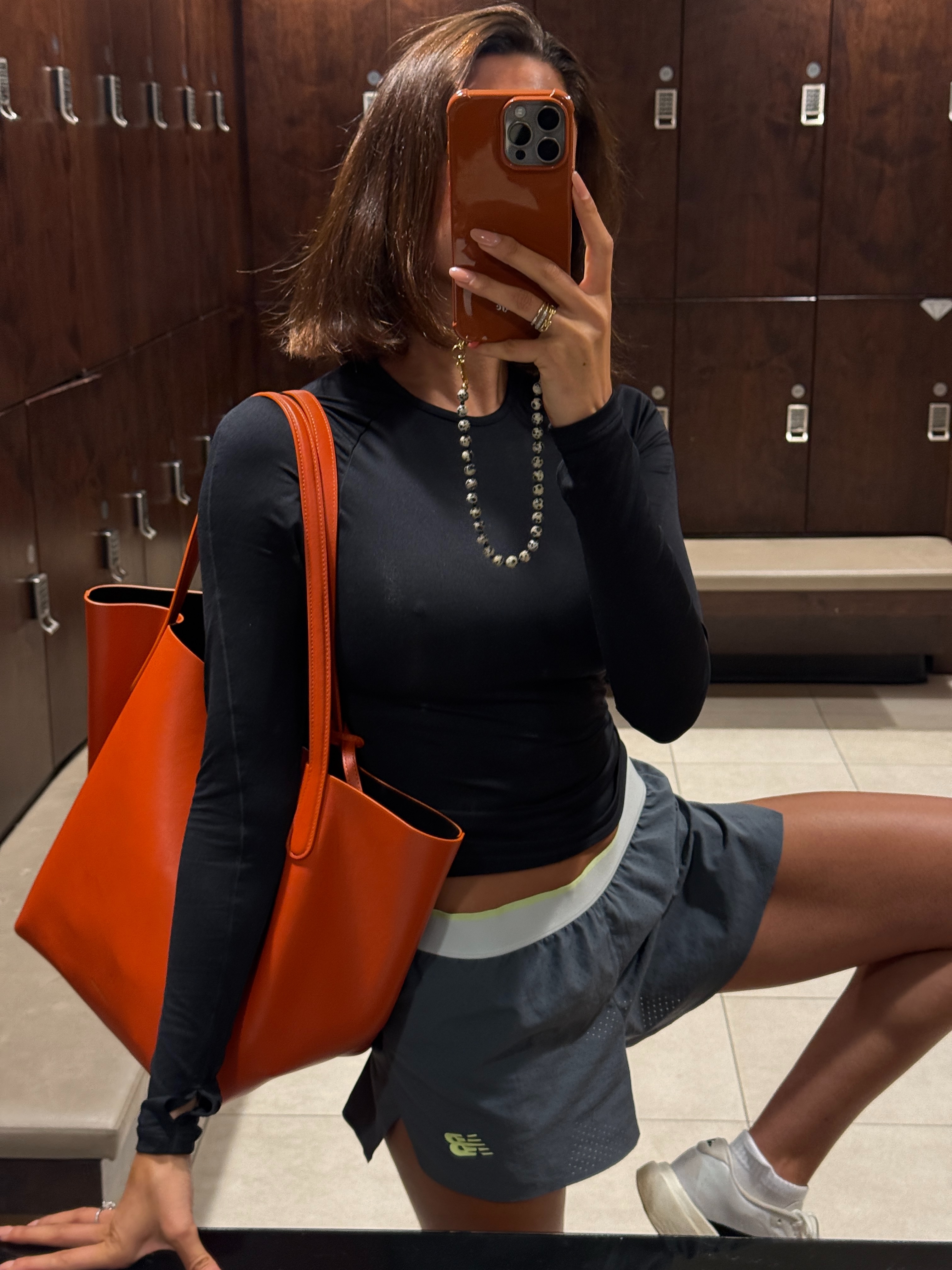 An image of a woman wearing best shoes with sporty shorts