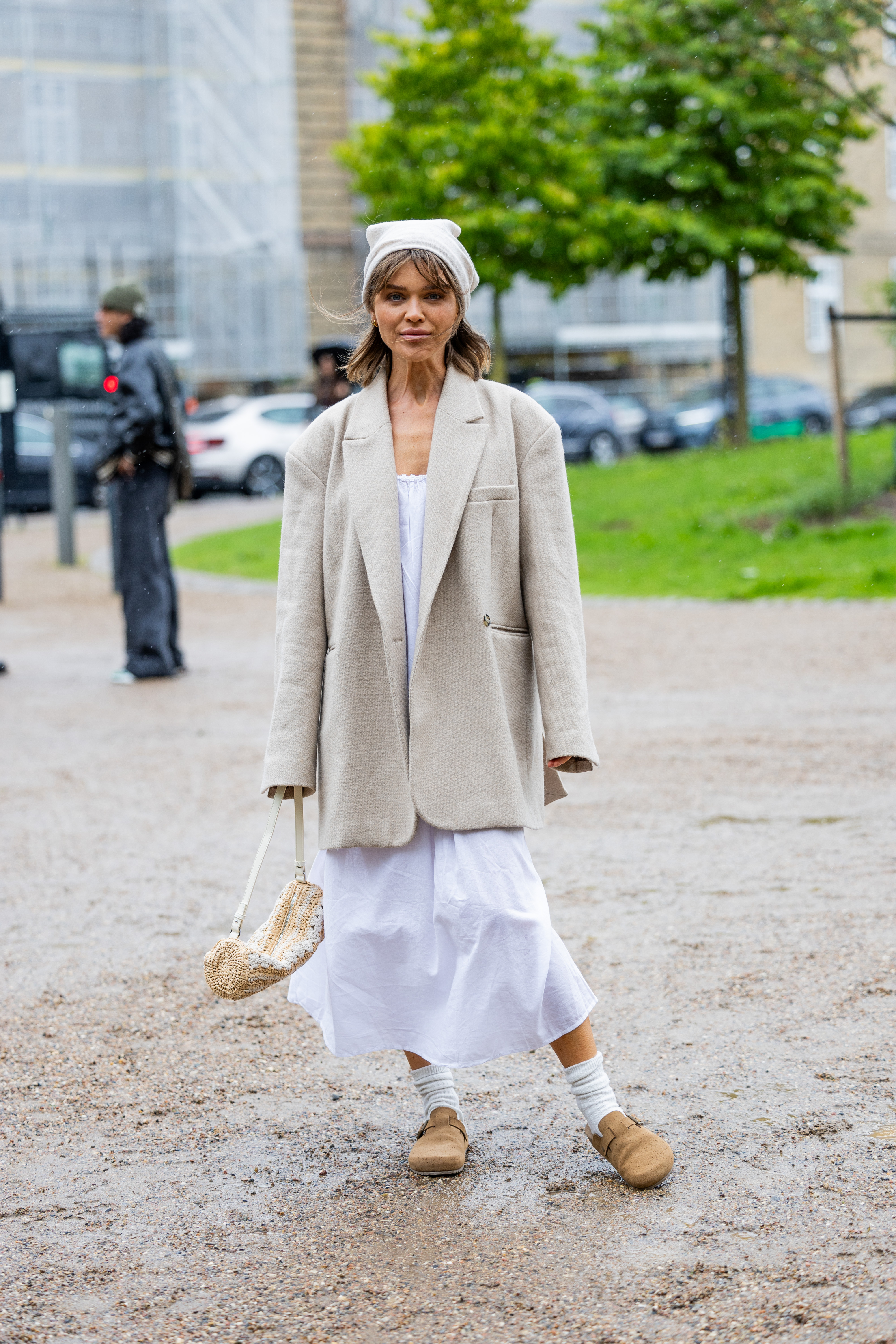 Person wearing Birkenstock shoes.