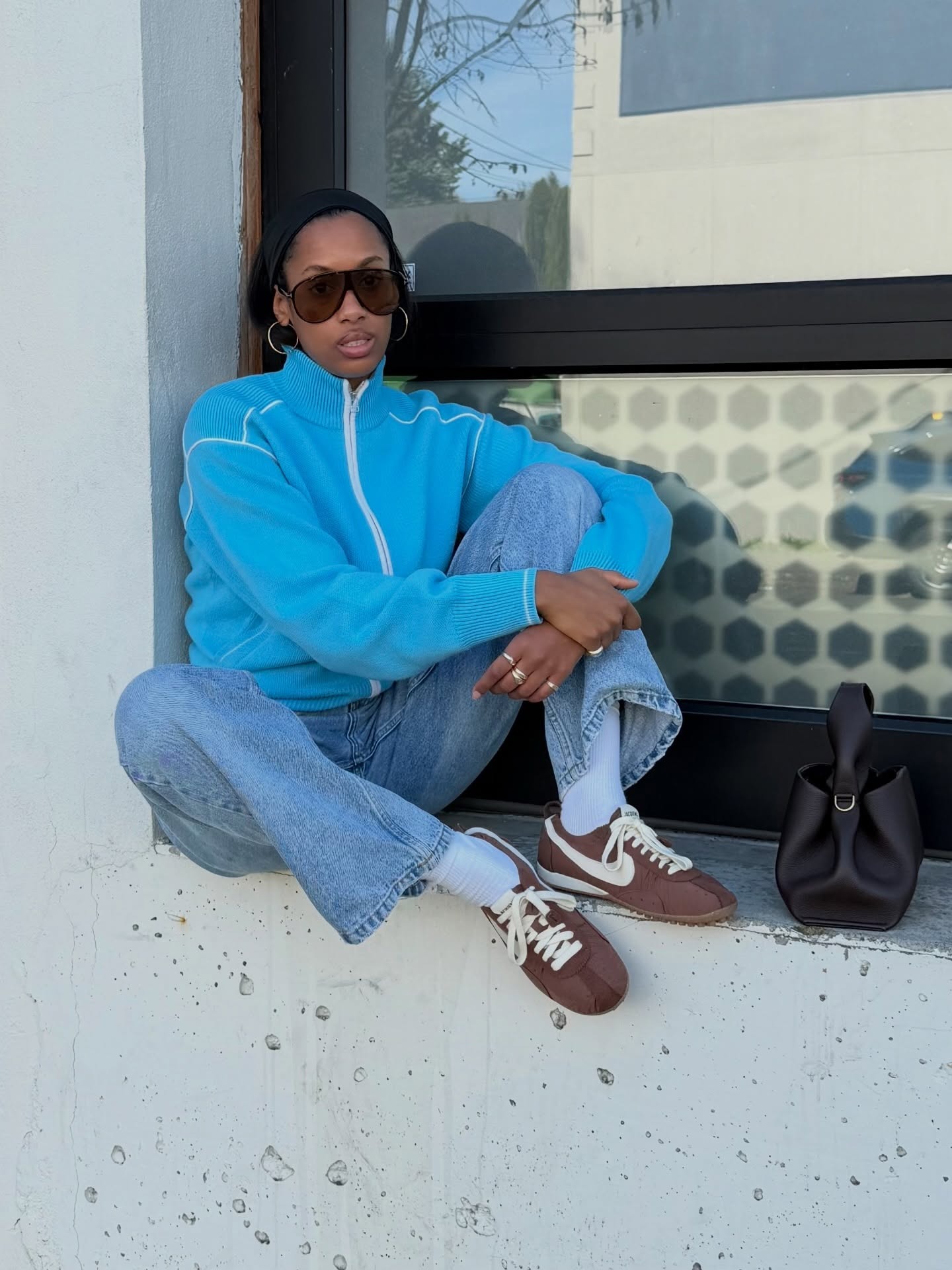 Influencer wearing brown Nike x Jacquemus Moon Shoes