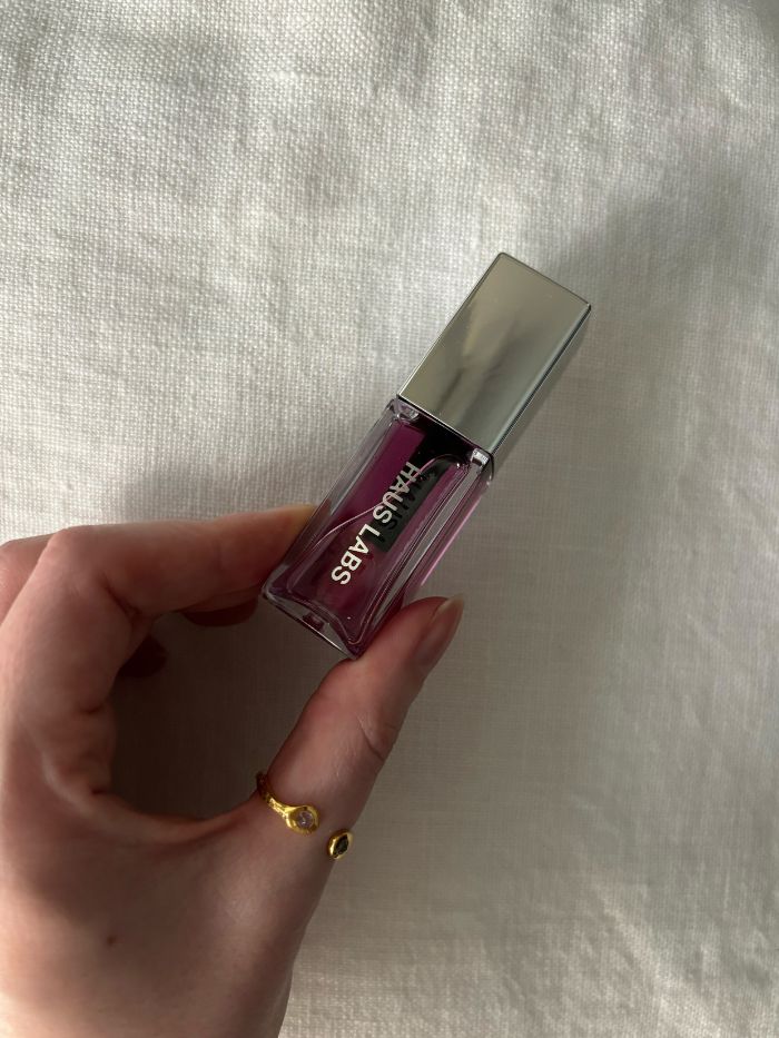 Deputy beauty editor Grace Lindsay testing the HAUS Labs PhD Hybrid Lip Oil