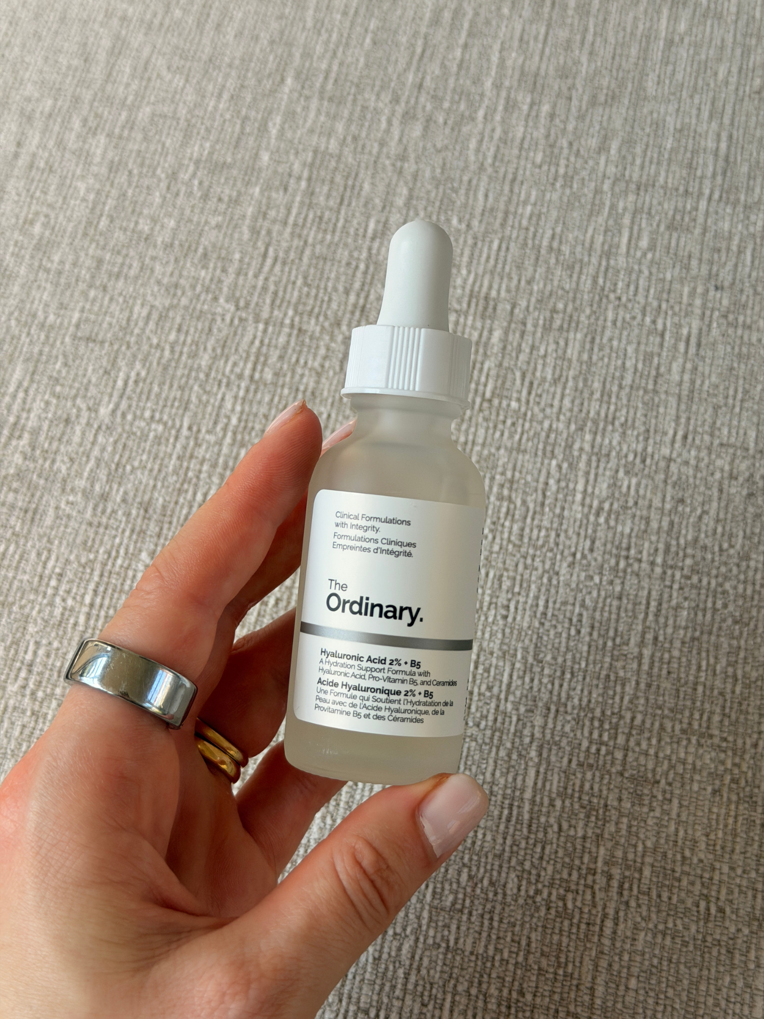 Grace holding The Ordinary Hyaluronic Acid + B5