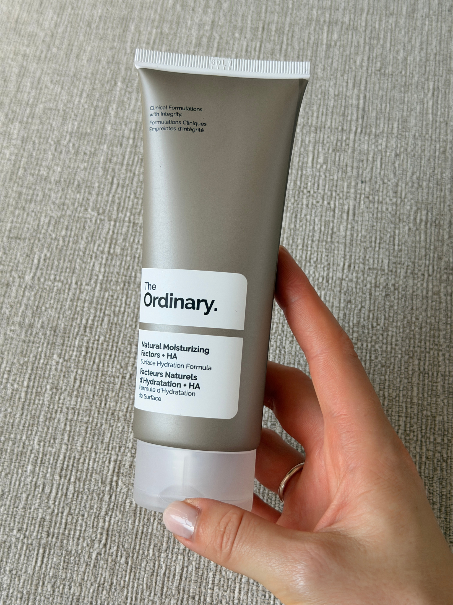 Grace holding The Ordinary Natural Moisturising Factors + HA