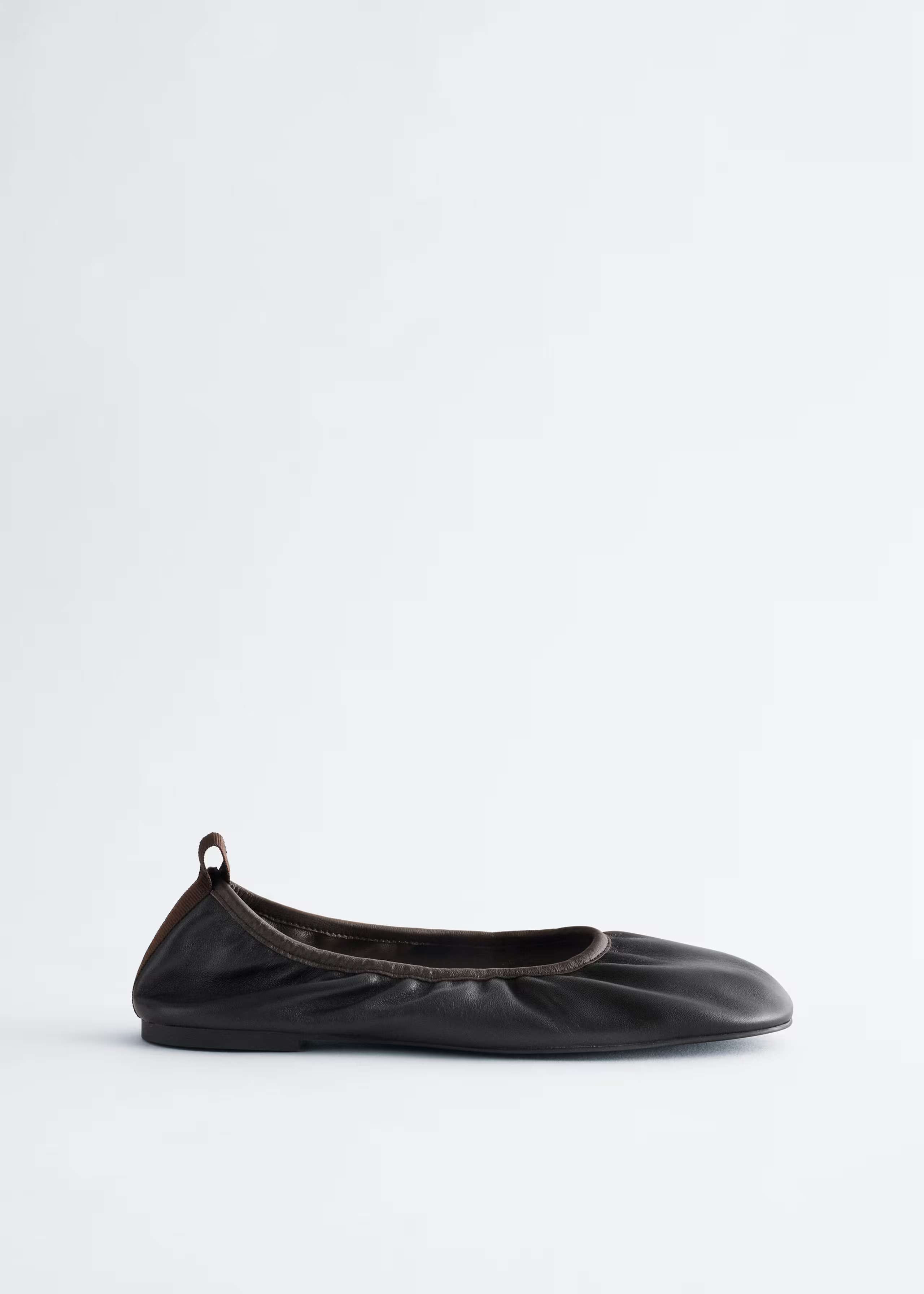 Black ruched ballet flats