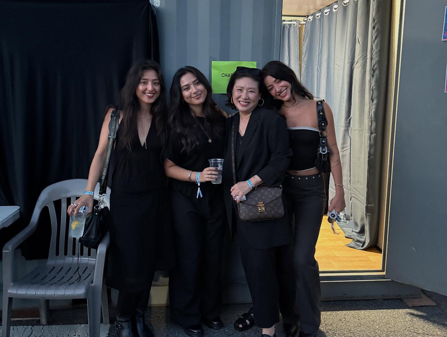 Celebrity makeup artist Yasmin Istanbouli with her mom and sisters backstage at a Charli XCX concert.