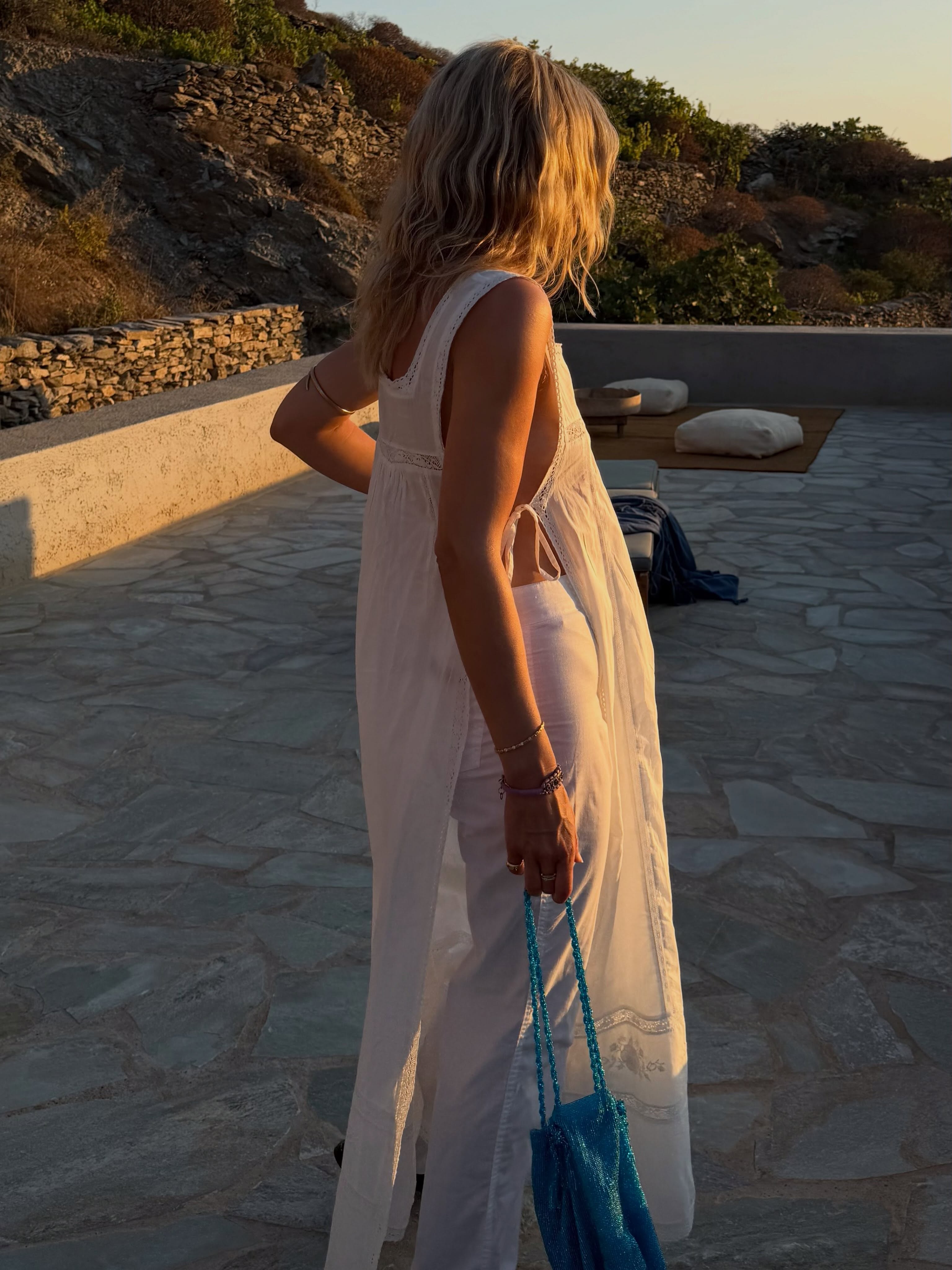 Lucy Williams wears a dress over trousers.
