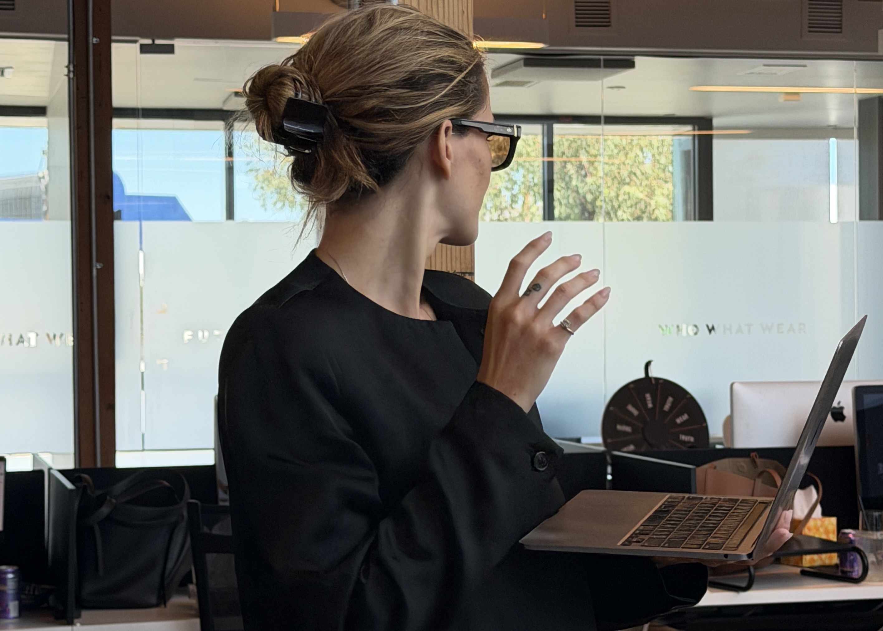 Eliza Huber wearing Alo's new yellow-lens Skinny Oval sunglasses.