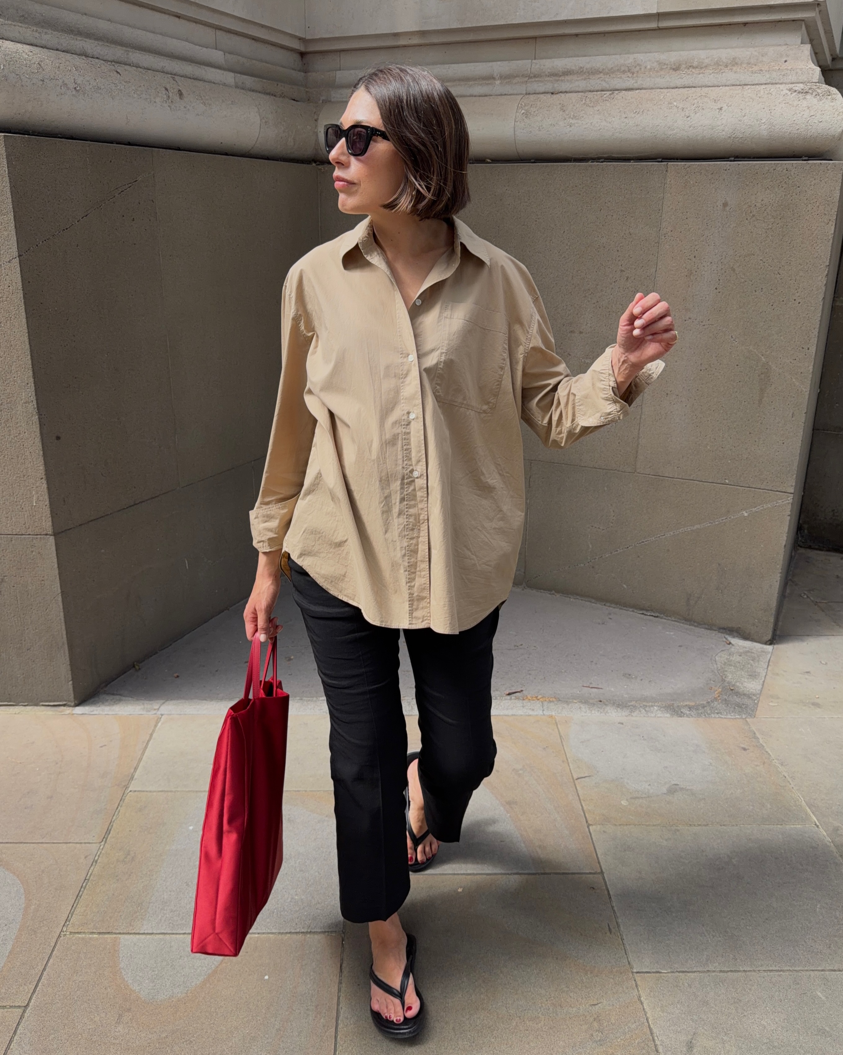 Lucy Alston wears Oxford Shirt, Cropped Trousers and Flip Flops