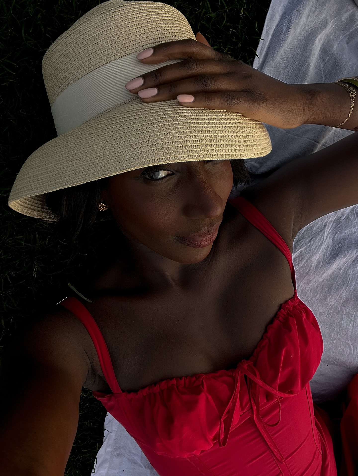 French woman wearing a stylish summer outfit.