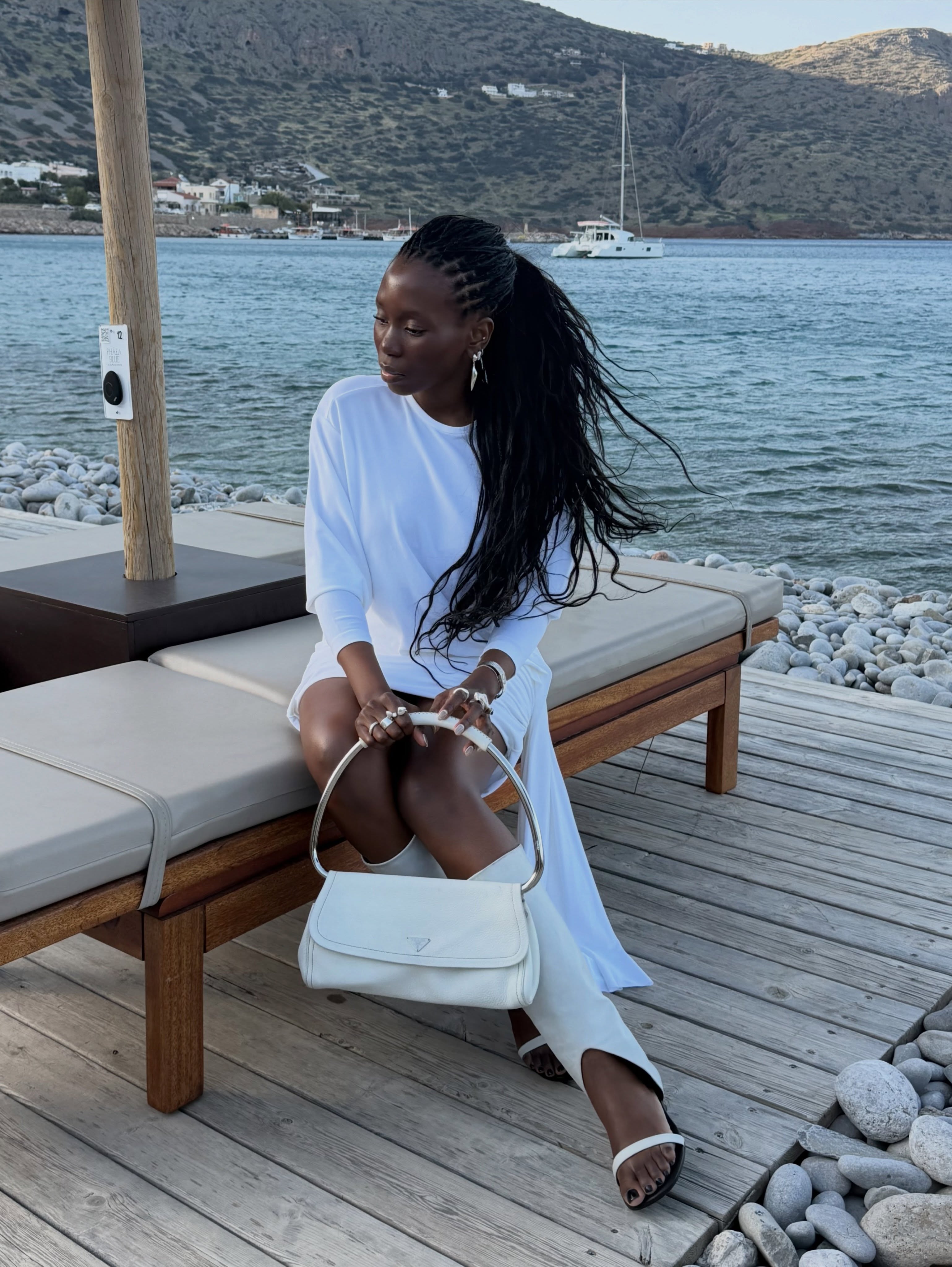 Danielle in all-white summer outfit