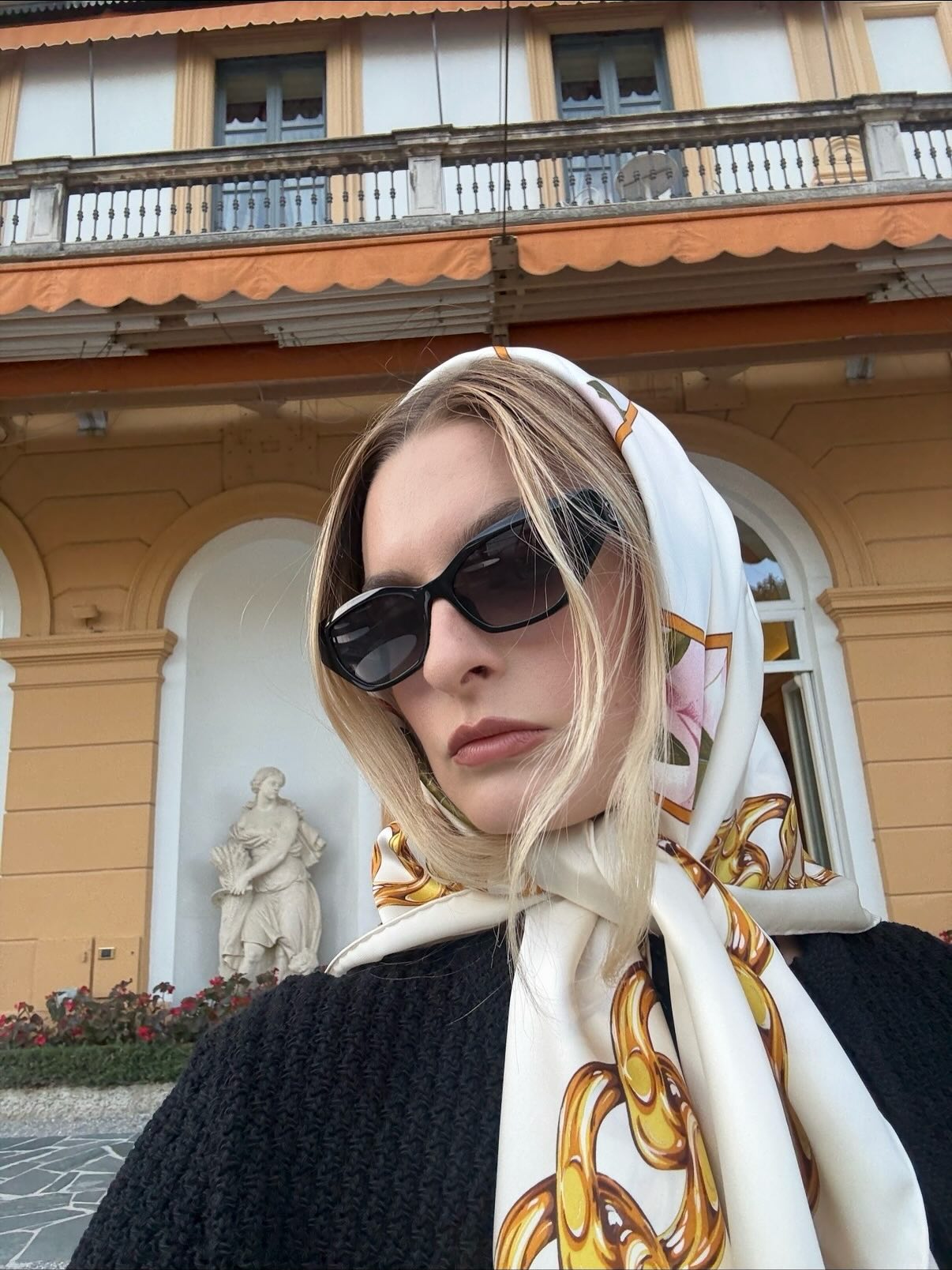 Christie in silk scarf and sunglasses