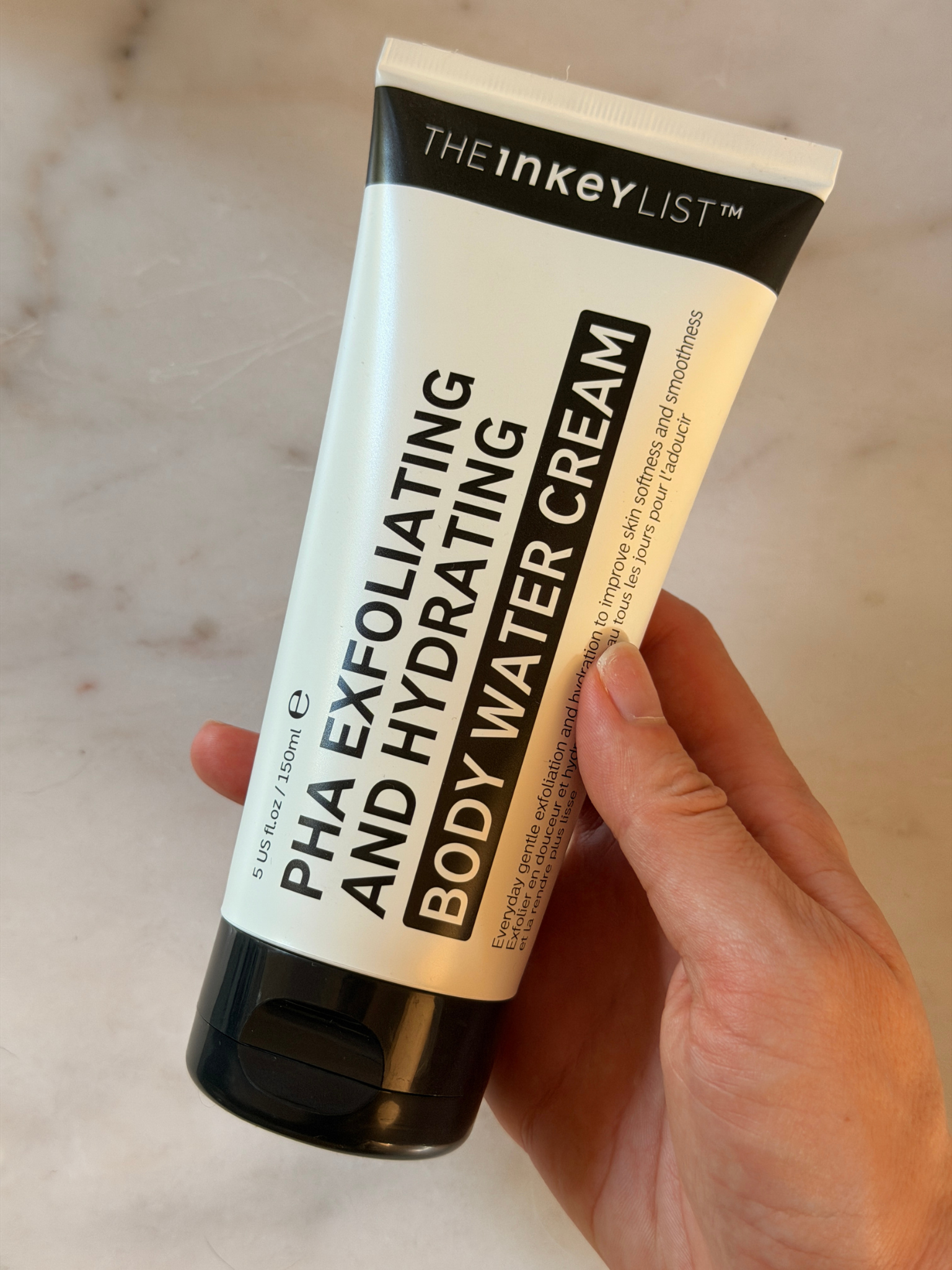 Grace Day holding The Inkey List moisturiser