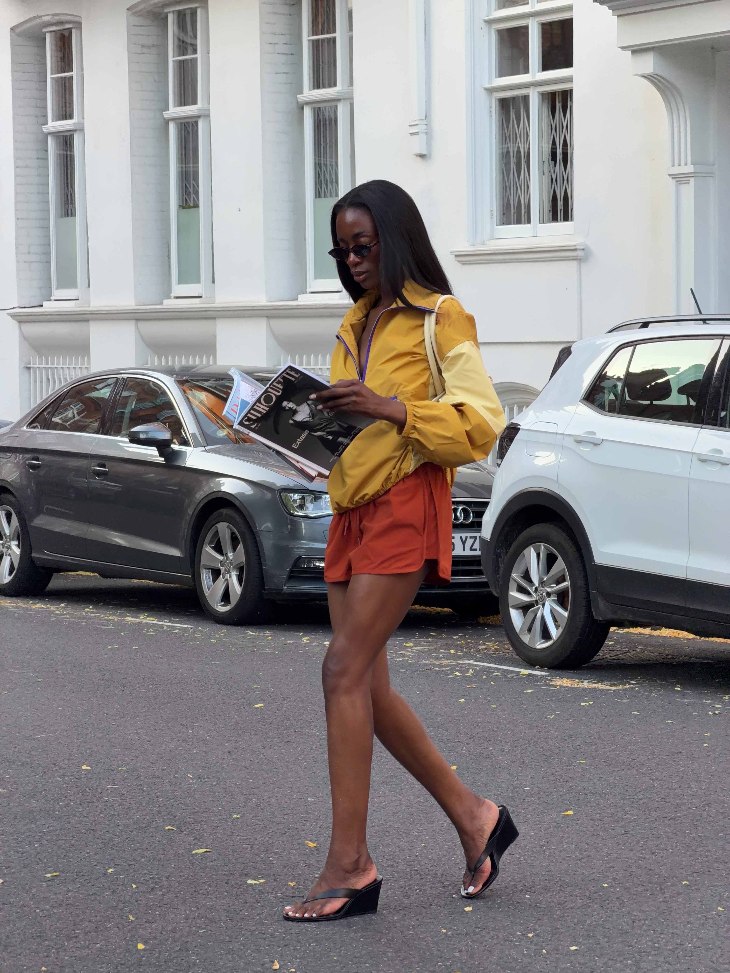 Liv Madeline wears heeled flip-flops.