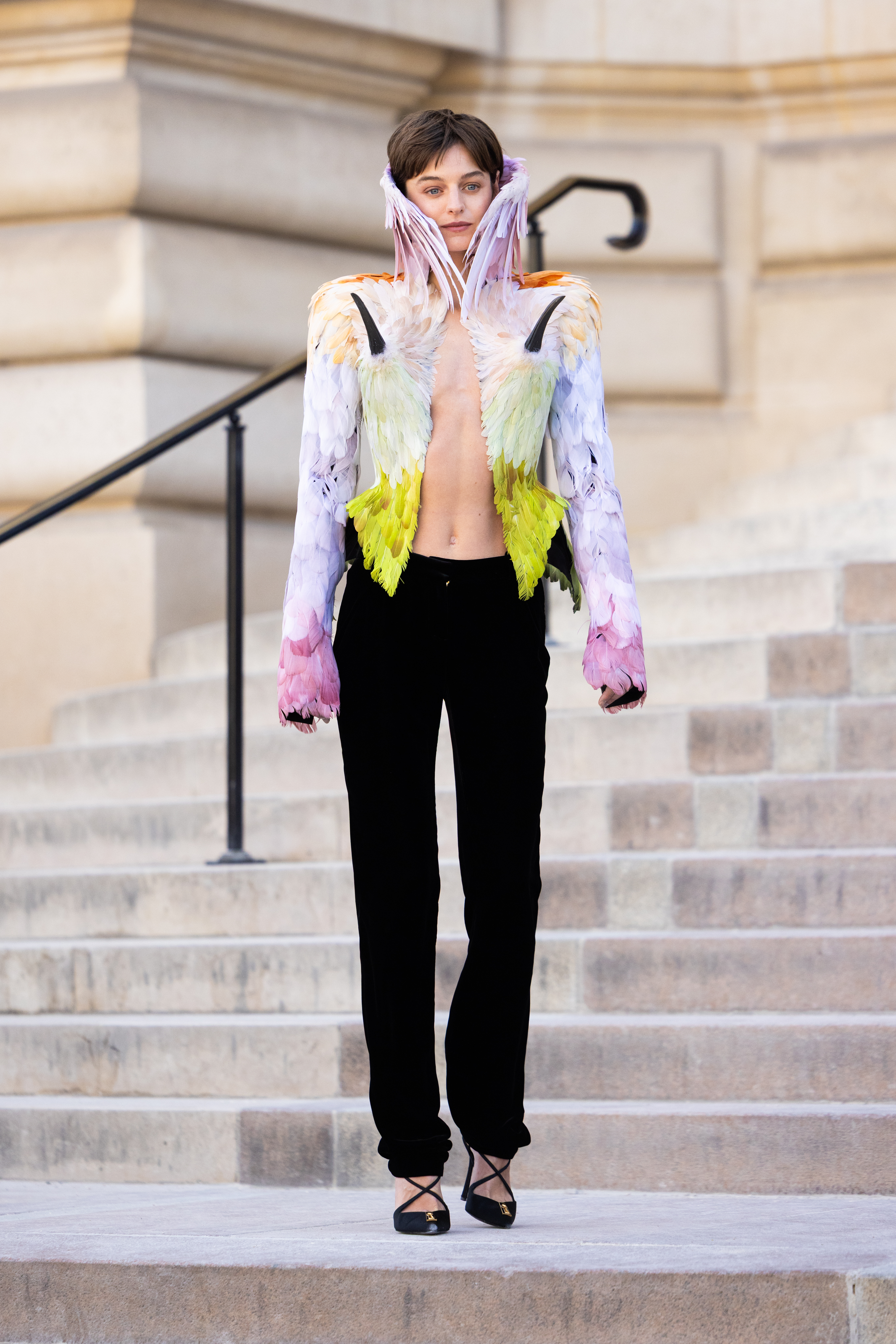 An image of Emma Corrin at the Schiaparelli Haute Couture  FW26 show.