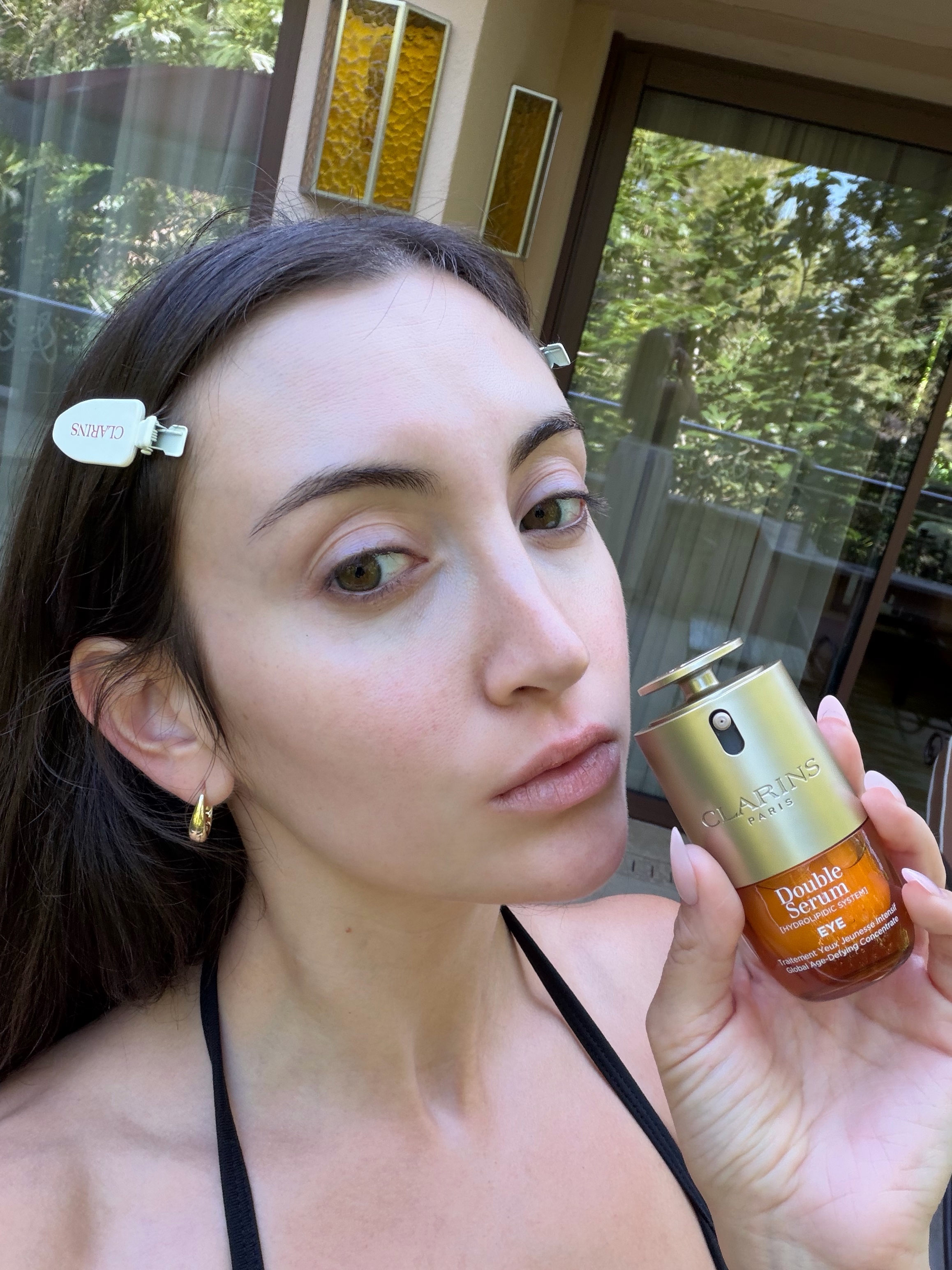 Who What Wear associate beauty editor Alyssa Brascia's first day testing the Clarins Double Eye Serum.