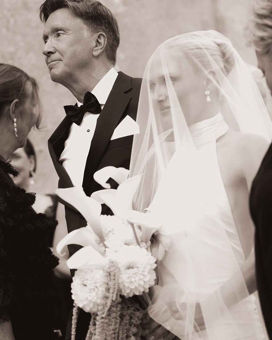 Karoline walking with her dad during the ceremony.