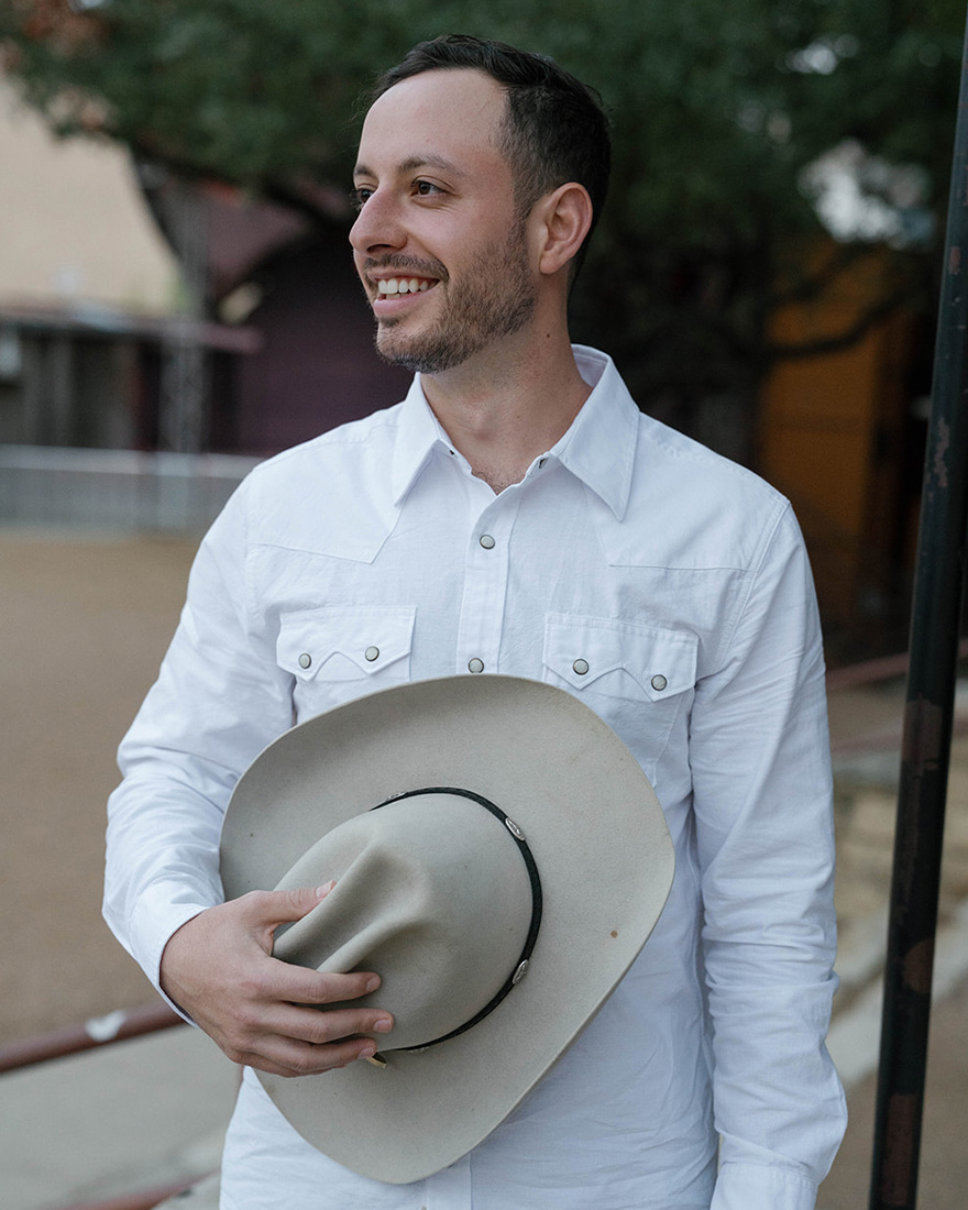an image of adam at the welcome dinner.