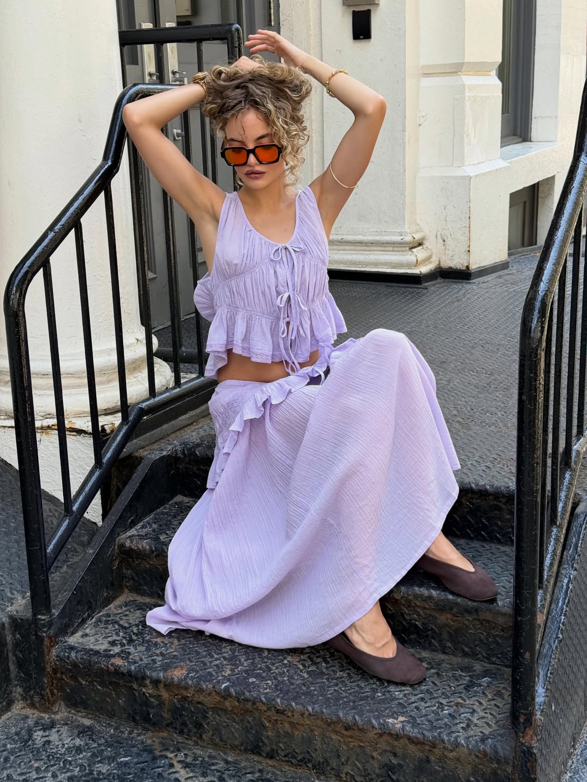 Content crestor in purple set on stairs