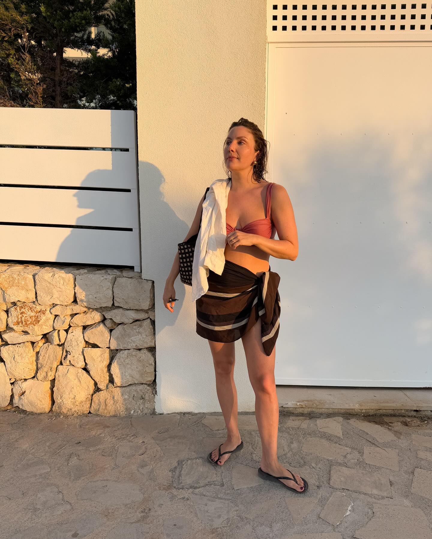 An image of @emmahoareau wearing a powder pink bikini, one of the biggest bikini colour trends of 2026.