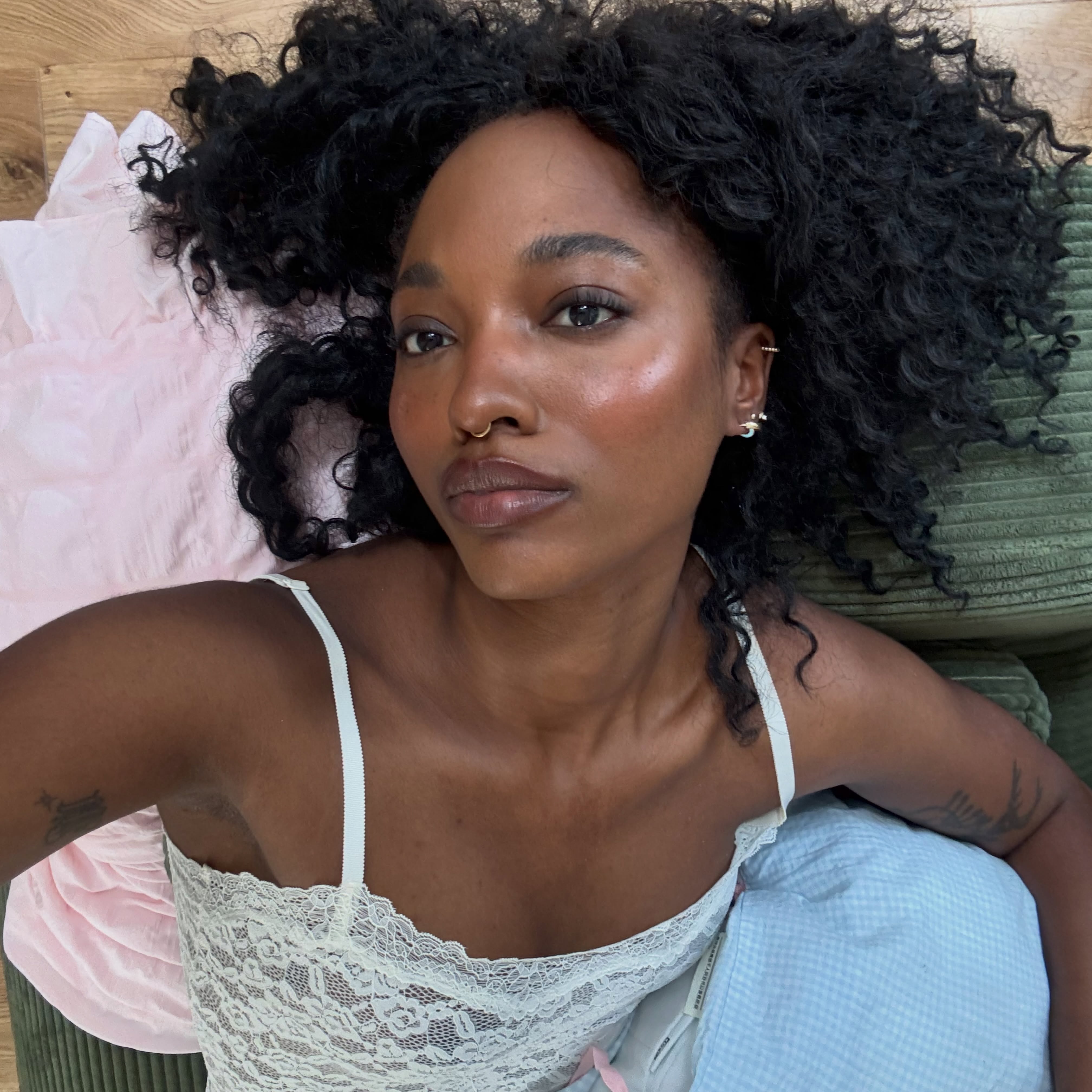 An image of a woman with glowing skin.