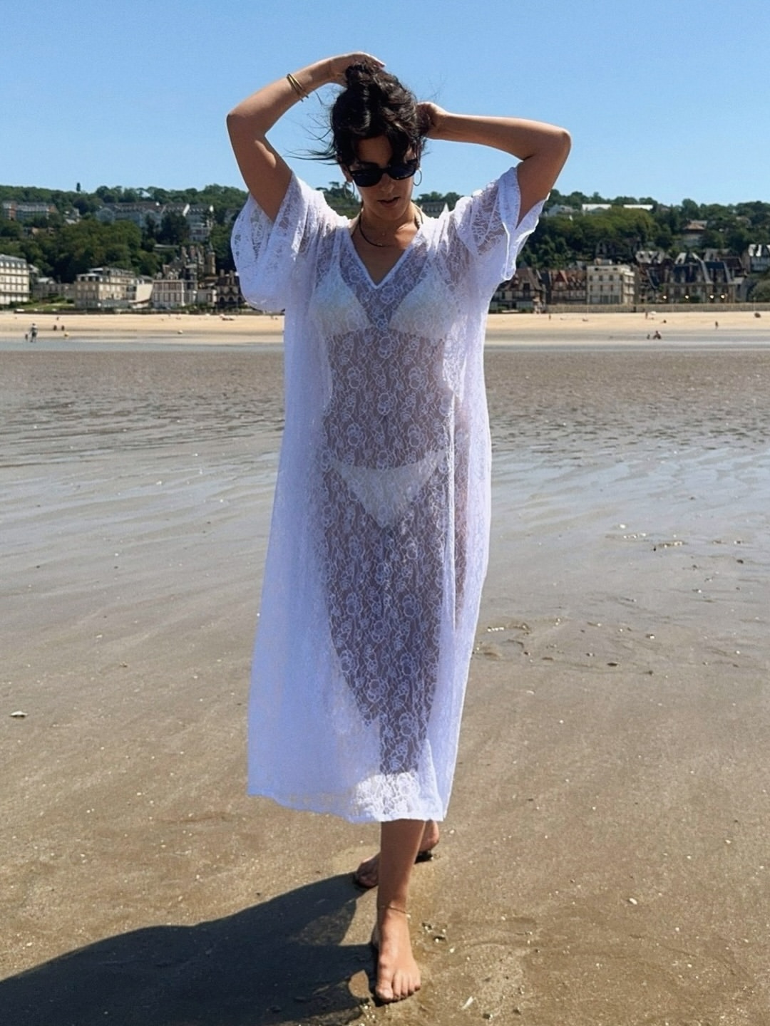 Diane Kari in a white cover-up