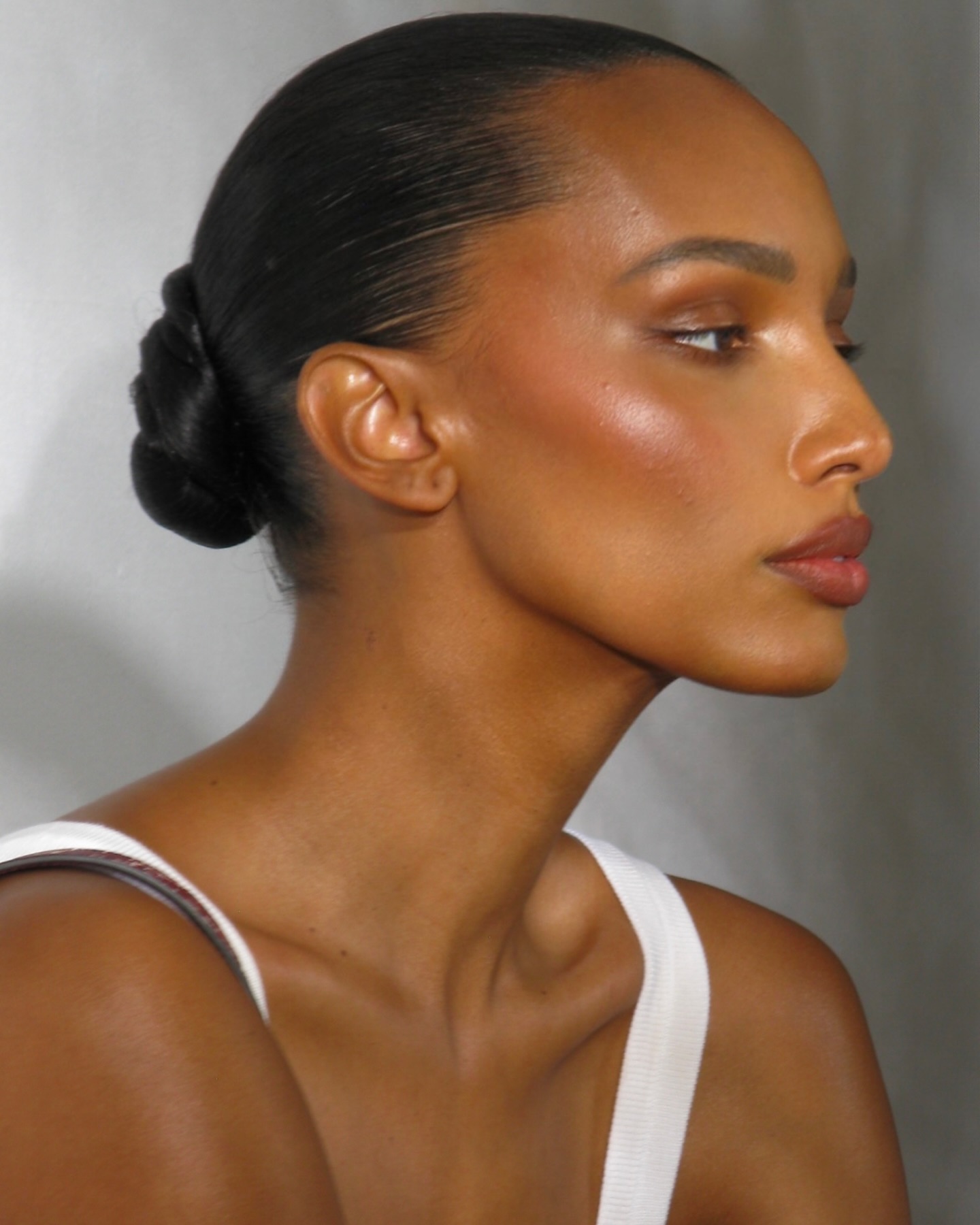 Jasmine Tookes with a glowy highlighter