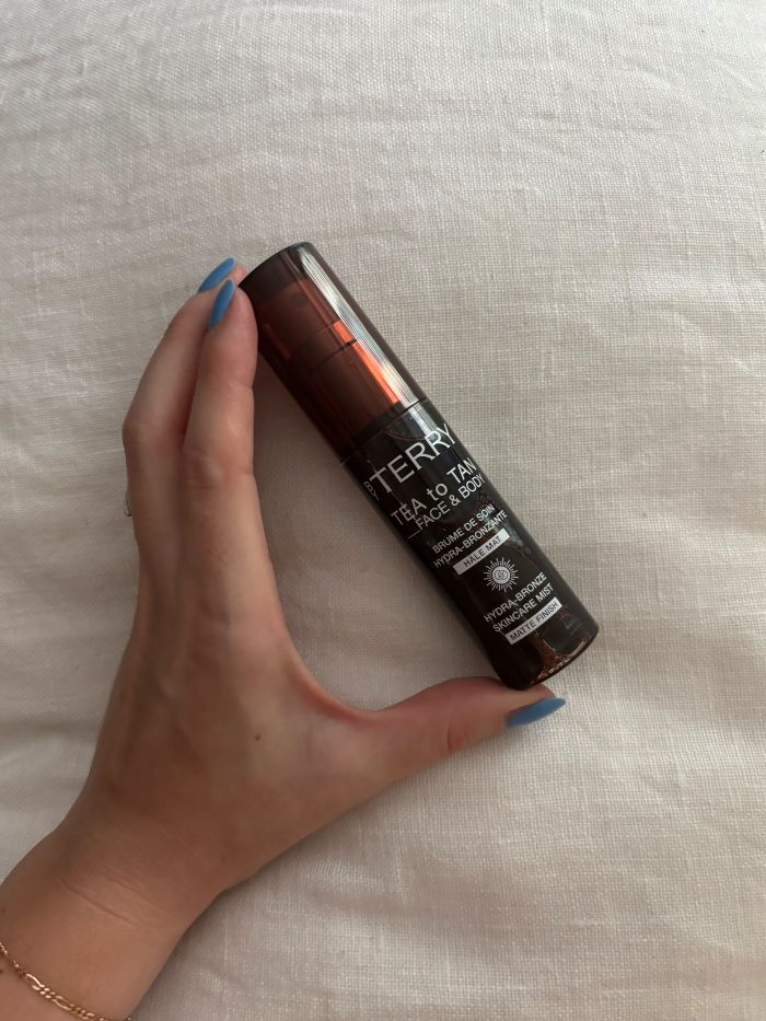 Deputy beauty editor Grace Lindsay testing the By Terry Tea to Tan