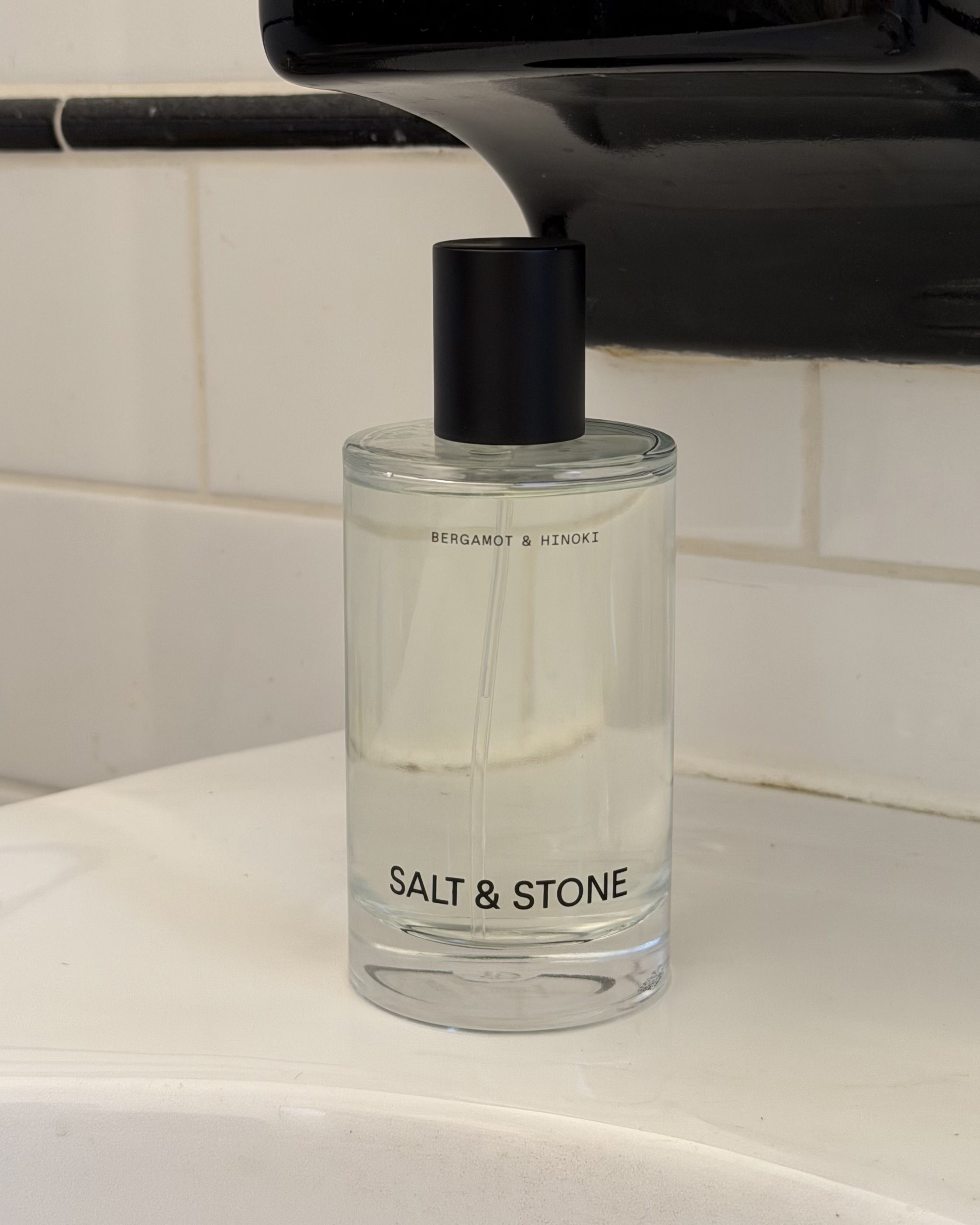An image of associate beauty editor Alyssa Brascia's Salt & Stone Salt & Stone Bergamot and Hinoki Body and Hair Fragrance Mist.