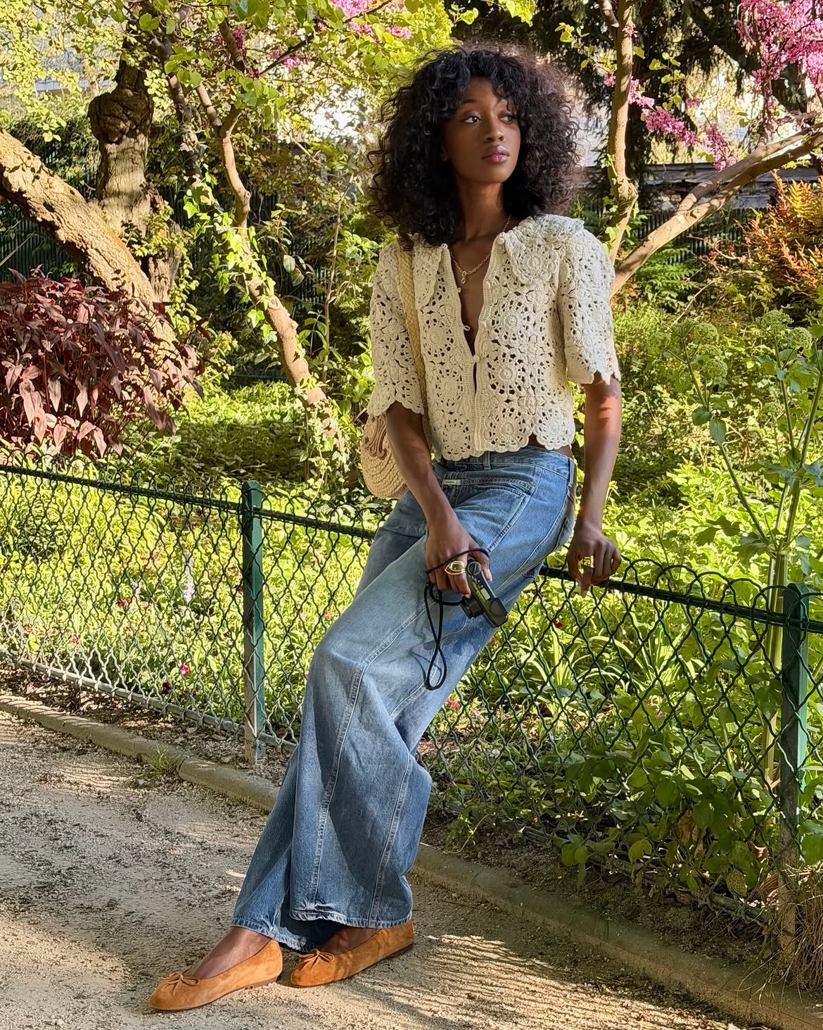 Emmauelle Koffi wearing a crochet top with jeans in Paris