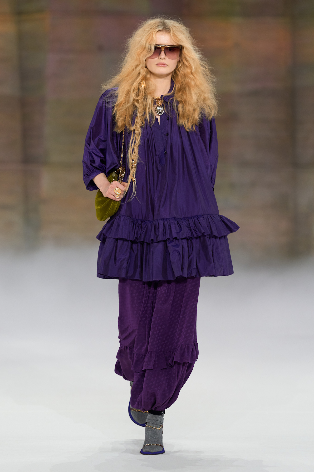 Woman wearing purple on the Chloe fall/winter 2026 runway.